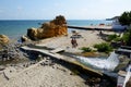 The people taking sunbath on a beach