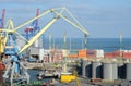 Odessa cargo port with grain dryers,transport containers and colourful cranes,Ukraine