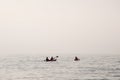 Odessa, South of Ukraine, Coast of a Black Sea, beach Langeron, June 28, 2018. Silhouettes of people resting at the water. Calm. M