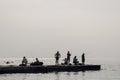 Odessa, South of Ukraine, Coast of a Black Sea, beach Langeron, June 28, 2018. Silhouettes of people resting at the water. Calm. M