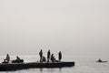 Odessa, South of Ukraine, Coast of a Black Sea, beach Langeron, June 28, 2018. Silhouettes of people resting at the water. Calm. M