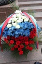 Odessa, Ukraine - Apr.6, 2011: A wreath in colors of Russian flag, tricolor, near Eternal Flame monument during official visit of