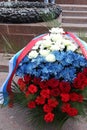 Odessa, Ukraine - Apr.6, 2011: A wreath in colors of Russian flag, tricolor, near Eternal Flame monument during official visit of