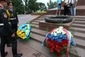 Odessa, Ukraine - Apr.6, 2011: A wreath in colors of Russian flag, tricolor, near Eternal Flame monument during official visit of