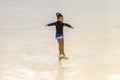 ODESSA, UKRAINE -11 Apr 2019: Young children figure skating on ice arena of stadium. Little girls learn to skate. School of figure