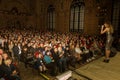 Odessa, Ukraine - April 8, 2019: crowd of spectators at rock concert by ALOSHA during music show. Crowds of happy people enjoy