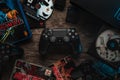 Odessa, Ukraine - April 12, 2019: The DualShock4 Wireless Controller for PlayStation4. Gamepad black for PS4 on a vintage wooden Royalty Free Stock Photo