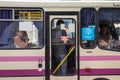 ODESSA, UKRAINE - AUGUST 13, 2015: Passengers looking out of the window of a marshrutka