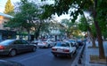 Odessa, Ukraine Ã¢â¬â August 4, 2020: Preobrazhenskaya street near the Cathedral square and city Park, green trees and people, road