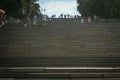 ODESSA, UKRAINE - AUGUST 6, 2014: Selective blur on people descending Potemkin stairs. The Odessa stairs, that got pictured in the