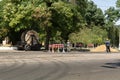 Odessa, Ukraine - August 8, 2019: Workers pull a roll of high voltage cable line