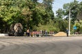 Odessa, Ukraine - August 8, 2019: Workers pull a roll of high voltage cable line
