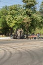 Odessa, Ukraine - August 8, 2019: Workers pull a roll of high voltage cable line