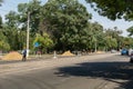 Odessa, Ukraine - August 8, 2019: Workers pull a roll of high voltage cable line