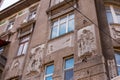 Odessa, Ukraine - 04 17 21: bas-relief sculptures on classic modern style architecture building facade on Troitskaya