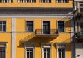 Odessa, Ukraine - 04 22 21: bright yellow facade of historical building in the city center. A photo background with