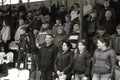 ODESSA, UKRAINE - CIRCA 2019: Crowds of fans in the stands of a football stadium during a match of regional clubs. Spectators at