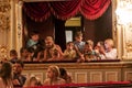 Odessa, Ukraine - CIRCA 2019: selective focus. Spectators children in theater during popular children`s play. Children`s Delight