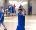 ODESSA, UKRAINE - CIRKA, 202020: Unidentified local team players play futsal futsal tournament on the parquet floor. The right mom