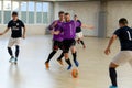 ODESSA, UKRAINE - CIRKA, 202020: Unidentified local team players play futsal futsal tournament on the parquet floor. The right mom