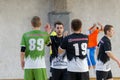 ODESSA, UKRAINE - CIRKA, 202020: Unidentified local team players play futsal futsal tournament on the parquet floor. The right mom