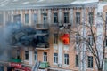 Odessa, Ukraine - Dec. 29, 2016: A fire in an apartment building. Strong bright light and clubs, smoke clouds window of their