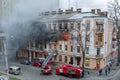 Odessa, Ukraine - Dec. 29, 2016: A fire in an apartment building. Strong bright light and clubs, smoke clouds window of their