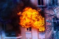 Odessa, Ukraine - December 29, 2016: A fire in an apartment building. Strong bright light and clubs, smoke clouds window of their