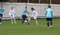 ODESSA, UKRAINE -31 DECEMBER 2021: Women\'s football on grass field of stadium. Football Championship among women White - FC