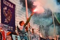 ODESSA, UKRAINE - July 21, 2018: Fans and ultras flare flares for the gate and throw them on the field during the finals of the