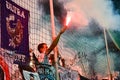 ODESSA, UKRAINE - July 21, 2018: Fans and ultras flare flares for the gate and throw them on the field during the finals of the