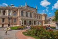 Odessa, Ukraine. July 22.2021. The historic building of the Opera, tourists near the sightseeing. Sunny day in the city