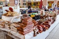 Odessa, Ukraine - July 18, 2019. Privoz market. Various smoked meats, sausages and bacon on a market counter for sale Royalty Free Stock Photo