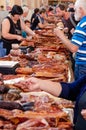 Odessa, Ukraine - July 18, 2019. Privoz market. Various smoked meats, sausages and bacon on a market counter for sale Royalty Free Stock Photo