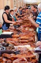 Odessa, Ukraine - July 18, 2019. Privoz market. Various smoked meats, sausages and bacon on a market counter for sale Royalty Free Stock Photo