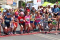 Marathon with children. Kid runners at finish line at summer maraton