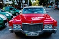 Odessa, Ukraine - June 27, 2022: 1971 Cadillac DeVille US sedan in red