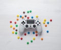 Odessa, Ukraine - june 11, 2012: The DualShock4 Wireless Controller for PlayStation4. Gamepad white for PS4 on a white wooden