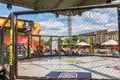 ODESSA, UKRAINE-June 30, 2019: Fighters of MMA boxers are fighting without rules in cage ring of octagons. MMA fighters in ring at