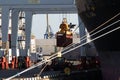 Odessa, Ukraine-202: Logistics terminal sends import-export cargo containers to cargo ship in seaport. Industrial landscape with