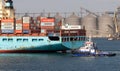 Odessa, Ukraine -2021: Logistics terminal shipment of import-export cargo containers on cargo ship in seaport. Industrial