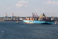 Odessa, Ukraine -2021: Logistics terminal shipment of import-export cargo containers on cargo ship in seaport. Industrial