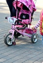 Odessa, Ukraine. March,2020.. Family Day. Parents` active leisure on foot with children in wheelchairs, roller skates, bicycles o