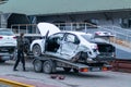 Odessa, Ukraine - March 11th 2020: Tow truck loads smashed car after traffic accident