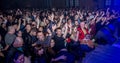 ODESSA, UKRAINE - March 23, 2019: viewers in auditorium of concert hall emotionally meet their favorite performers. Audience in