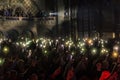 ODESSA, UKRAINE - March 23, 2019: viewers in auditorium of concert hall emotionally meet their favorite performers. Audience in