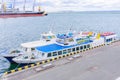 Odessa, UKRAINE - MART 1, 2021.The pleasure boat is moored to the pier of the Odessa port. Odessa port, black sea, Ukraine. Royalty Free Stock Photo