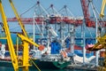 Odessa, Ukraine, May 4, 2019 - industrial seaport infrastructure, sea, cranes, containers and dry cargo ship, concept of sea cargo
