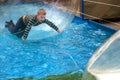 Odessa, Ukraine - May 6, 2019. Little children in an inflatable balloon, having fun on the water. The ball in the water - Royalty Free Stock Photo