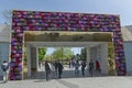 Odessa, Ukraine: Peopel in Arcadia alley decorated gate with flowers